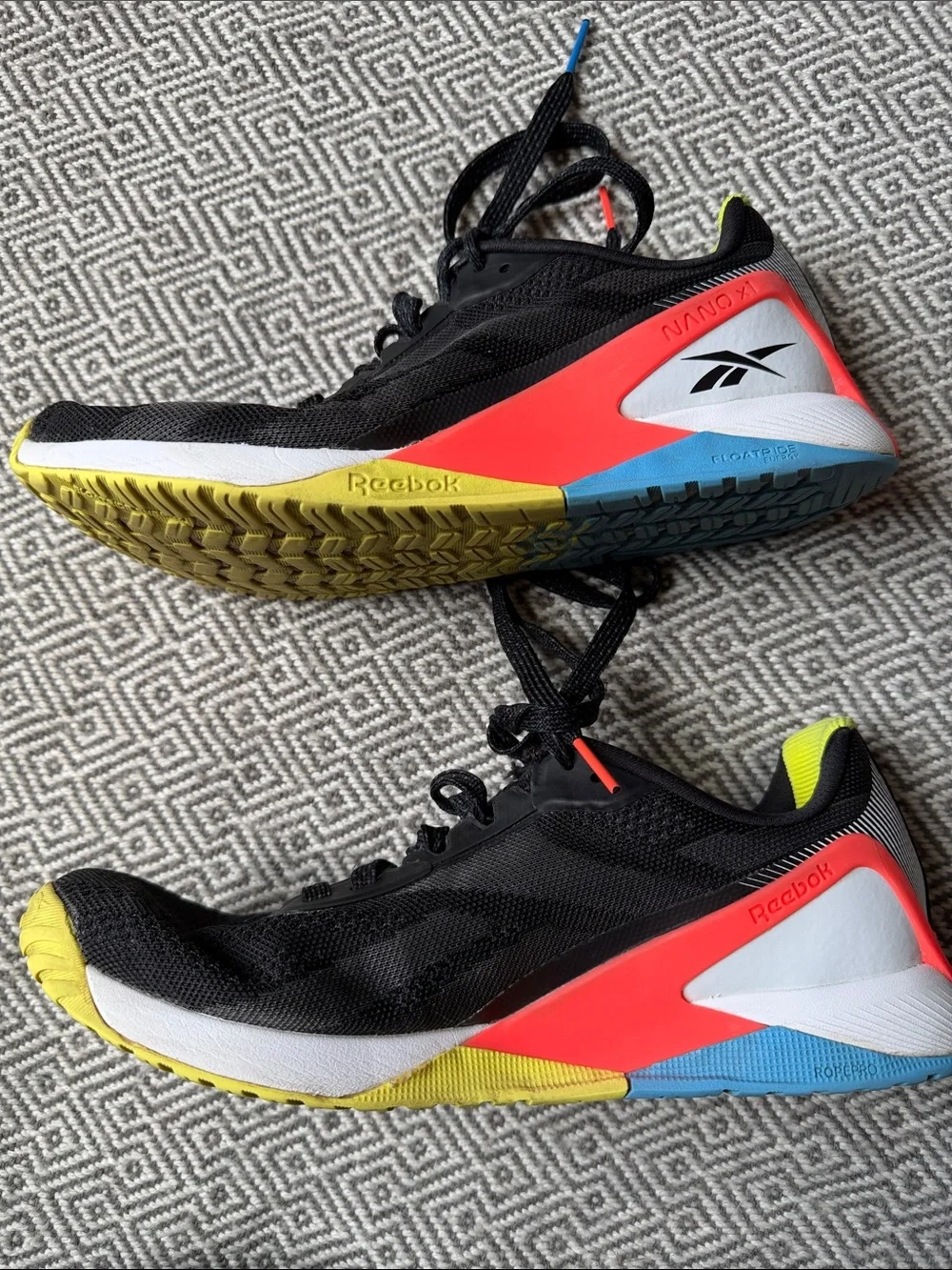 Reebok Nano X1 Black Running Shoes with Yellow, Red and Blue Accents